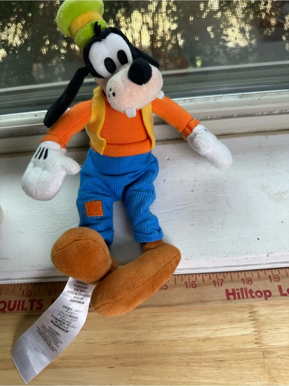 Disney parks collectible Goofy Plush in Orange, Blue & Green Outfit